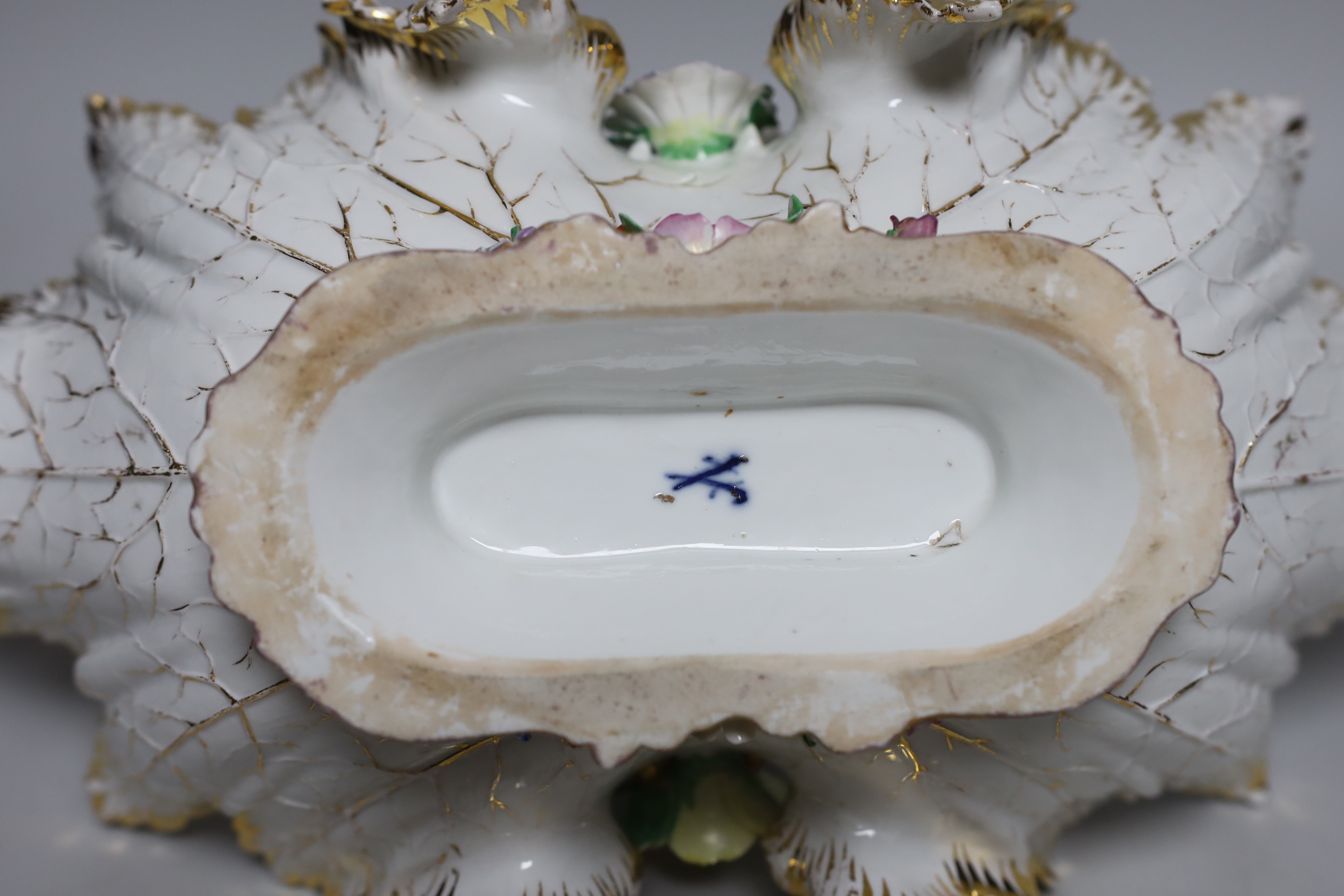 A large Meissen basket encrusted with flowers, 39cm long
